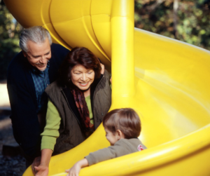 Parent having outdoor activities with child to prevent childhood obesity